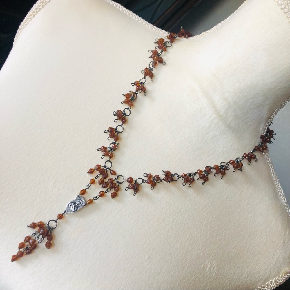 Religious brown glass bead silver tone y necklace